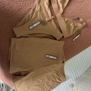 SKIMS Cream Seamless bikini and swim shorts